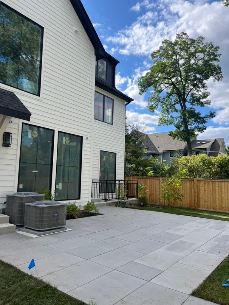 Large-format pavers creating a clean, contemporary outdoor living space