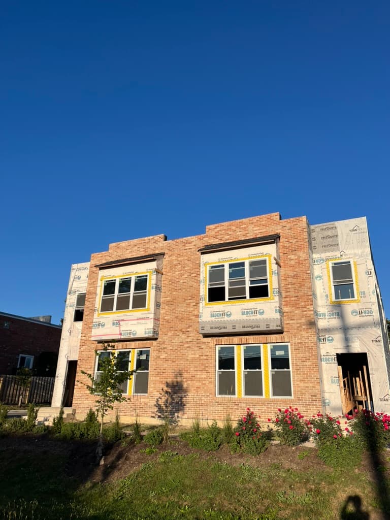 Traditional brick facade on new multi-family construction project